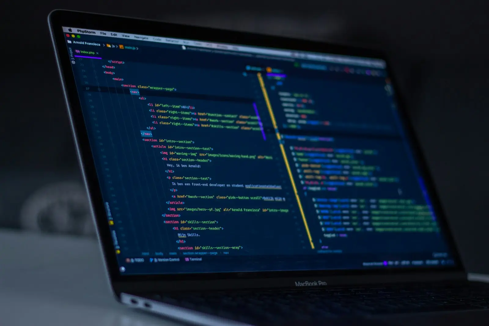 Laptop showing code during website maintenance